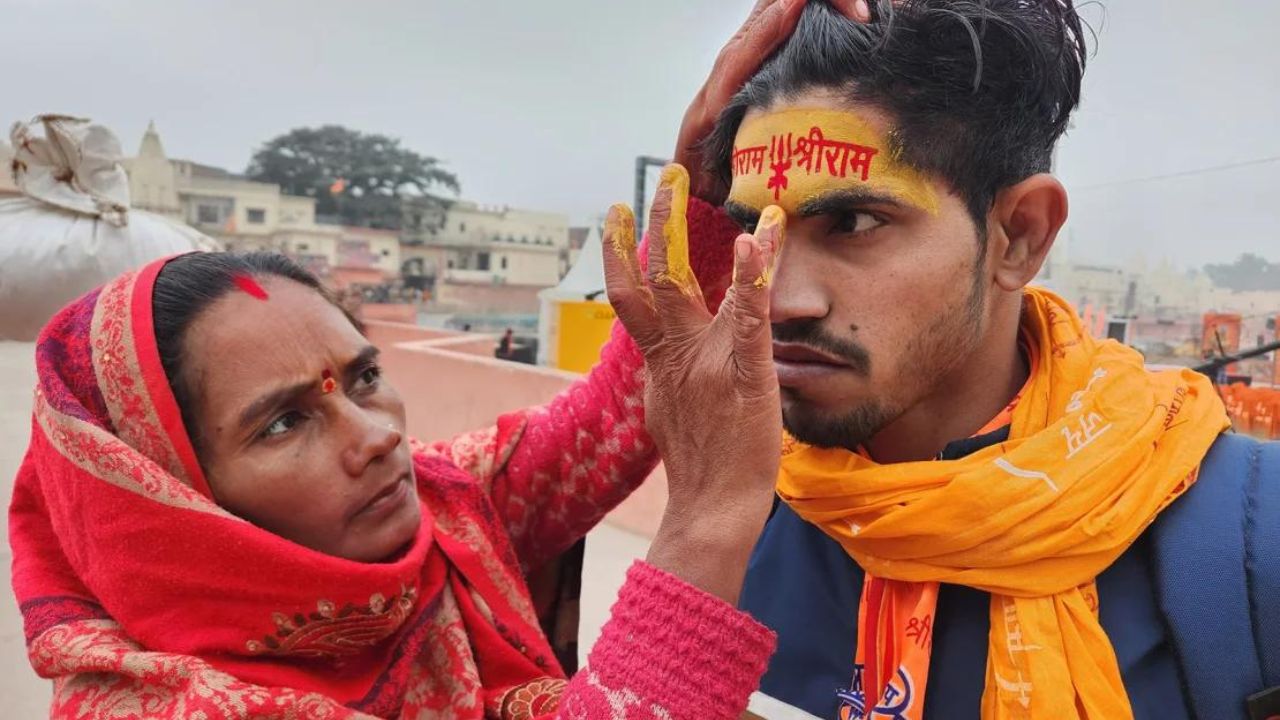 On January 22, a Hindu devotee in Ayodhya, India, was photographed with his face painted.