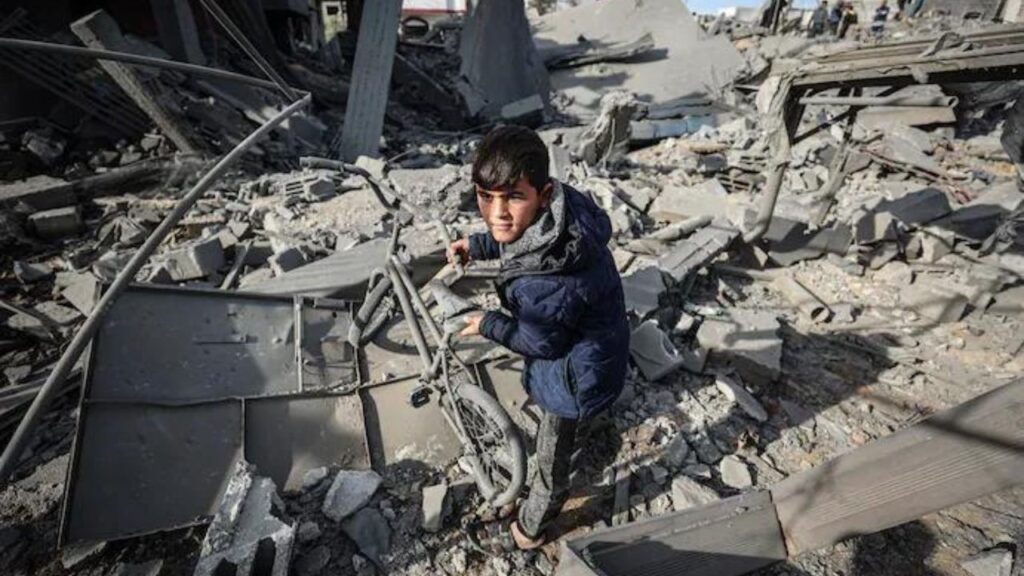 Palestinians inspect their destroyed homes after an Israeli airstrike killed more than 60 people in Rafah, southern Gaza Strip.