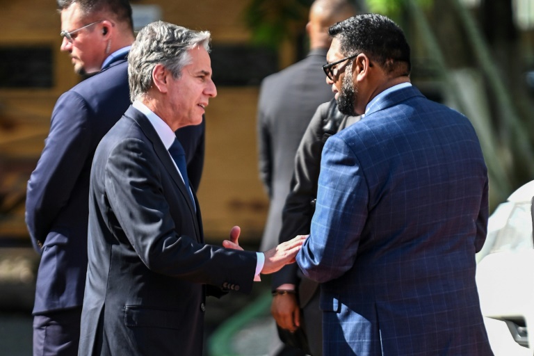 Guyanese President Irfaan Ali and US Secretary of State Antony Blinken (R) chat after a joint press conference in Georgetown, Guyana.