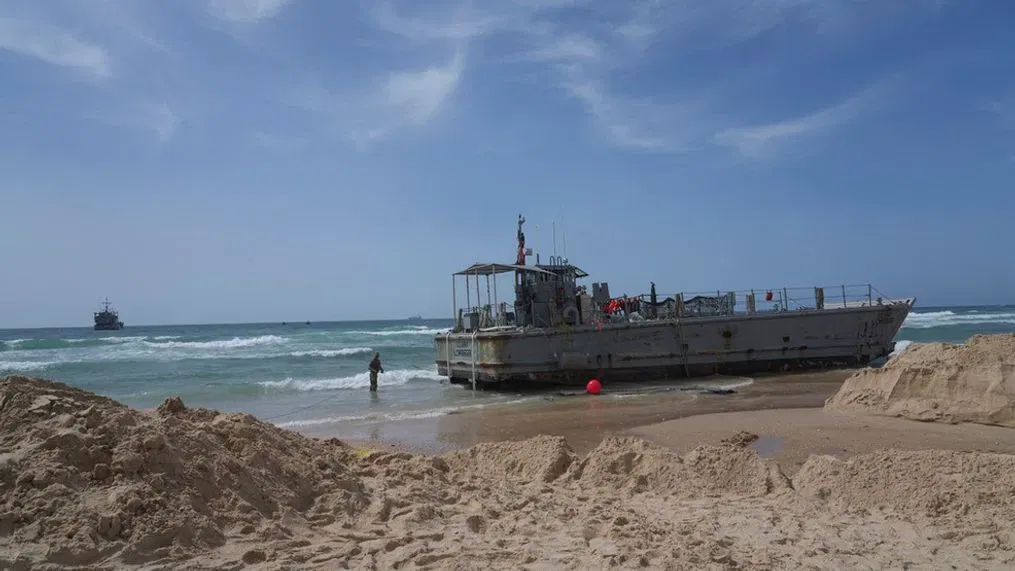 U.S. aid deliveries to Gaza by sea suspended after damage to temporary pier.